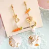 Trendy Hollow Rabbit Carrot Dangle Earrings Women Girls Creative Asymmetrical Bunny Pendant Earrings Ear Studs Jewelry Gifts