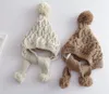 リトルガールズポンポンかぎ針編みの編み帽子幼児の子供たちのねじれ手作りベルベットライティングウォームビーニーチルドレンパーティーキャップS0878