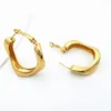 Kolczyki obręcze Wyolbrzymiony złoty kolor metal dla kobiet geometryczne skręcone vintage Earrigns Prezenty biżuterii