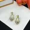 orecchino di gioielli di lusso orecchini di design per le donne acciaio inossidabile placcato oro argento ago v lettera chiave di blocco cuore cristallo orecchino a cerchio regalo Accessori