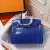 Classic Crocodile Pattern Platinum Bag 2023 New High End Designer Tote Bag European och American Fashion Cowhide Large Bag Luxury Wallet Crossbody Handbag