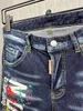 Mäns jeans 2023 modevarumärke Mäns vattentvätt slitna hål skaka målarcykel denimshorts A6011 230426