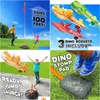 Brinquedos esportivos Brinquedos esportivos Dinossauros Blasters Rocket Launcher para crianças lançam até 100 pés presente de aniversário ao ar livre jogo de brinquedo drop delivery dhp0u