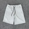 Męskie spodenki do joggingu mody swobodny wygodne spodnie para luźne w brytyjskim stylu młodzieżowe refleksyjne spodnie z suwakiem