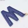 Principais anéis ingleses Alfabet Keychain Presente criativo PU Leather liga de flanela de flanela Tassel Acessórios BACA PENELE
