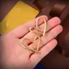 Stijlvolle 18k gouden hartvormige oorbellen dames prachtige eenvoudige oorbellen ontwerper voor dames huwelijksfeest cadeau-sieraden