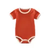 Kläder sätter nyfödd baby 100% ribbad bomull Bedårande fast färgkläder Organisk romper Jumpsuit