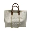 2022 Nieuwe kleine geurige canvas met lederen handketen Pearl Beach Mommy One Shoulder Tote Bag Groothandel handtassen 30 dollar