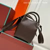 Yüksek kaliteli mini kova çantası üst lüks tasarımcı crossbody çanta çanta bayanlar moda deri çanta çanta