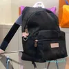 新しいバックパックの女性ハンドバッグプロセスレザーハンドバッグショルダーバッグキャンバスカモフラージバックパック40x30x20cm