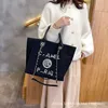 2021 Fashion Canvas One Counter Cantlique Straddle Beach Prosesatile Ins Tote Bag Wholesale Handbags 30 $