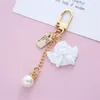 Keychains Creative White Angel Keychain Vintage Mini Pearl Keyring Gold Color Car Key Holder Bag Charms Accessories Holiday Gift For Women