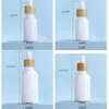 Opal White Glass Bottle 15ml 30ml 50ml with Bamboo Dropper 1OZ Wooden Essential Oil Bottles Porcelain Uoiak