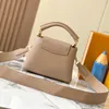 Yüksek kaliteli çiçek crossbody çanta tam tahıl tasarımcısı el çantası lüks kadın omuz çantası Shionable Orijinal deri katı harf dekorasyon crossbody tote çanta