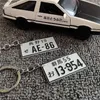 Sleutelringen Aluminium Auto -nummers Japans kenteken Number Keychain JDM Racing Car Motorcycle Tag Key Ring Gepersonaliseerd kentekenplaat J230427