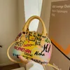TOTES 20222 Wysokiej jakości torebka graffiti marka marki torby na ramię mody torebki crossbody designer tle dla kobiet urocza skorupa