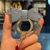 Ключевые кольца автомобиль Keyring Gold Athestone Металлическое кольцо кожаное лук