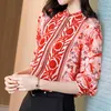 Kvinnors polos skjorta kvinnors ljus lyx 2023 V-ringning våren och hösten röd mode topp utländsk elegant retro tryck mångsidig