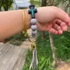 Boho personnalisé croix silicone perles cristal bracelet en cuir pu gland porte-clés