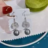 Dingle örhängen Hengsheng trendiga 10-11mm runda tahitain svarta pärlor av 925 sterling silver droppe för kvinnor starkt ljus mindre brist