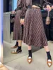 Designer de vestido de duas peças Nova tendência dupla f manga comprida casaco curto moda casual ff plissado de meia saia para mulheres