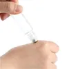 5 ml 10 ml rouleau sur bouteille bouteilles à rouleaux en verre transparent givré avec bouchon en plastique à grain de bois pour huile essentielle Axcjf