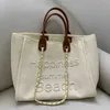 2022 Nieuwe kleine geurige canvas met lederen handketen Pearl Beach Mommy One Shoulder Tote Bag Groothandel handtassen 30 dollar