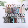 UPS Moda PU Pulsera de cuero Monedero Llavero Fiesta Borlas Brazalete Llavero Titular Tarjeta Bolsa Silicona Con cuentas Muñequera Bolso Mujer Muñeca Coche Anillos con borla