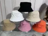 Chapeaux de seau de concepteur pour femmes et hommes classiques solide quatre Seasen unisexe mode décontracté chapeaux de luxe casquette en lambeaux