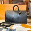 Designer axelkoppling äkta läder keepall mode m41424 duffel väskor lyxiga kvinnors män bagage crossbody stor rese hand väska berömda topphandtag stamväskor