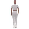 Pantalon deux pièces pour femmes KEXU blanc Sexy Slash Neck manches courtes haut court évider ensembles de trous Club Party femmes survêtements assortis