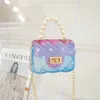Mini gelé handväska godis färg transparent liten crossbody väska söta prinsessor handväskor med pärlhandtag för barn