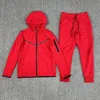 Men s Tracksuits 2023 Spring and autumn men s hooded jacket splicing suit leisure sports jogging two piece set 231127