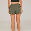 LLU Yoga Short Pants Kvinnor Yoga Outfits Hög midja som kör elastiska shorts Träna vuxna byxor med zip upp drop-in fickor flickor sportkläder med kontinuerlig dragkonditionering