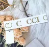 Mulheres designer de marca letra de letra de lenço de cabeça de fita de cabeça de parada de peças de cabelo de turbante Crystal algodão de tecido de algodão