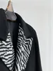 Blends Luxusmarke, langer Wintermantel aus Wolle, hochwertiger Designer-Revers-Panel, ursprünglicher berühmter Mantel, zweireihiger schwarzer Zebra-Mantel