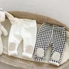 Pantalones de invierno para bebé, ropa a cuadros de algodón, pantalones para niño y niña, mallas gruesas y cálidas de Color sólido, pantalones lindos de terciopelo