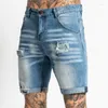 Jeans pour hommes tendance de mode décontractée printemps et ceinture d'été vieille tube droit moulu blanc blanc lavage des hommes shorts de rue en vrac