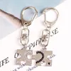 Porte-clés 2023 Couple pendentif porte-clés hommes et femmes sac à dos épissage amour crochet Type porte-clés mode femmes bijoux cadeau