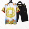 Desiner Mens Tracksuit Summer Fashion Male Setters Print Print Short Sleeve Tees Suit Hih End Quality 15カラーTシャツトップとショートパンツ2ピースセット男性