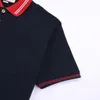 23 nouveaux polos de créateurs pour hommes polos d'affaires polos de luxe d'été polos de mode t-shirts à manches courtes revers affaires décontractés t-shirts en plein air couleur blanche XS-L