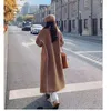 Women's Wool Blends Autumn and Winter Polo Collar Lång ärm Hornknapp Fake Lamb Hår Fashion Löst Elegant Mixed Fur Coat 231127