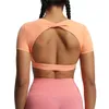 Tanques femininos Atlético Crop Tops Mulheres Verão Roupas Esportivas Cor Sólida Manga Curta Backless T-shirt para Yoga Running Fitness Exercício