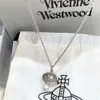 Designer vivienen Westwoods New Viviane Empress Dowager Western 3d Saturn Water Drop Pearl Necklace Female French Planet Ufo Water Drop Pearl Pendant High