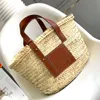 Borsa di paglia Borsa tote Borsa a tracolla da donna Borse scavate di alta qualità Borsa da spiaggia per vacanze estive di lusso Borse firmate Borsa in pelle bovina lavorata a maglia all'uncinetto Cinturino regolabile