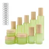 20ml 30ml 40ml 60ml 80ml 100ml 120ml Vaso per crema in vetro smerigliato verde Bottiglie per la cosmetica Bottiglia per pompa per lozione spray nebulizzata con legno imitato Nxrd