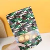 wholesale Sac d'emballage alimentaire de camouflage avec fenêtre épaissie sachet de thé Snack fruits secs boeuf séché scellé fermeture éclair sacs auto-scellants