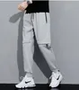 Pantaloni cargo con stampa di lettere Pantaloni da jogging Pantaloni sportivi da uomo Streetwear Pantaloni Harem sportivi Abbigliamento sportivo casual da uomo Pantaloni Harem Hip Hop Pantaloni con coulisse Capispalla in misto cotone