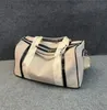 2023 Nya män Fashion Duffle Bag stor kapacitet Canvas Travel Påsar Kvinnor Bagage Tote Outdoor Travels Handväskor