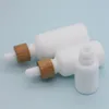 Opal White Glass Bottle 15ml 30ml 50ml with Bamboo Dropper 1OZ Wooden Essential Oil Bottles Porcelain Teebl